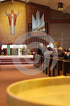 People, holy water in church