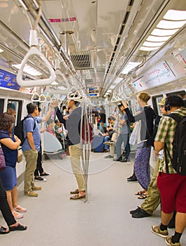 People inside subway train. Singapore