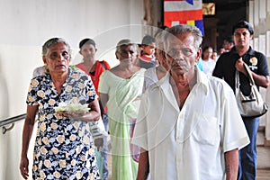 People inside the Temple of the Tooth