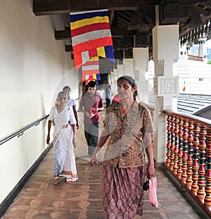 People inside the Temple of the Tooth