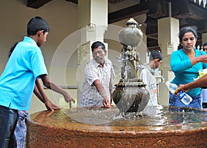 People inside the Temple of the Tooth