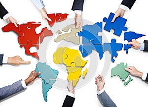 People with Jigsaw Puzzle Forming in World Map