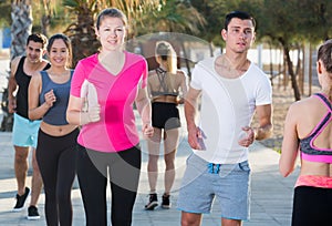 People jogging on city seafront