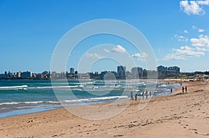People jogging and enjoying beach holiday on Cronulla beach. Australia