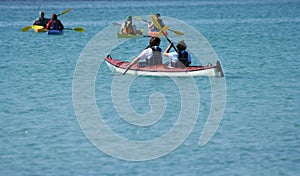 People kayaking