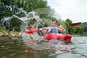 People kayaking