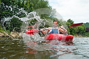 People kayaking photo