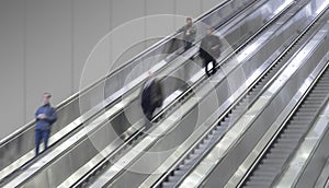 people keeping distance in escalator