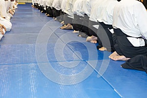 People in kimono and hakama on martial arts training seminar