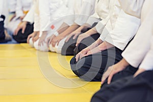 People in kimono and hakama on martial arts training seminar