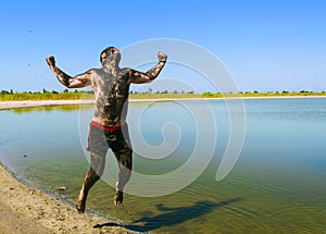 People make mud therapy and are very happy