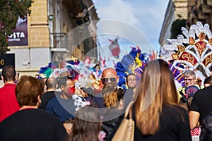 Annual Mardi Gras Fat Tuesday grand parade on maltese street of allegorical floats and masquerader procession