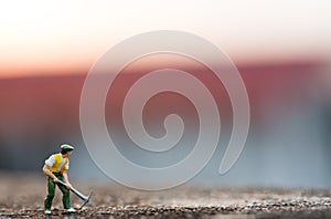 people mining on sky sunset background.