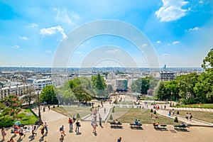 People in Montmartre stairway on a sunny day