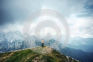 People in mountains, background alps