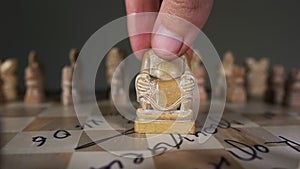 People move hand at camera king unusual chess closeup form of buddha slowmotion.