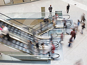 People moving on an Escalator