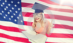 Student woman in mortarboard with encyclopedia