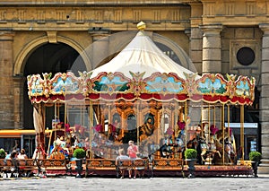 People near the Carousel at Piazza della Reppublica, Florence, Italy