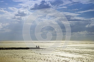People on the North sea beach in Germany.