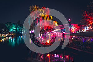 People at outdoor club in berlin at night photo