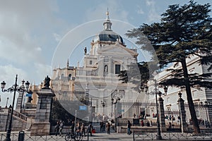 People outsdie Amudena Cathedral Catedral de la Almudena, Madrid, Spain