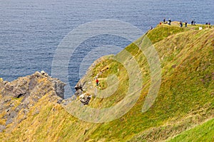 People over Cliffs of Moher