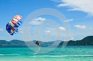 PEOPLE ARE PARASAILING in phuket