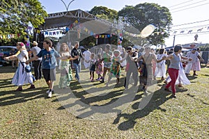 people perform folk dance during the traditional Sao Joao june fest. Brazil