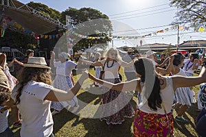 people perform folk dance during the traditional Sao Joao june fest. Brazil