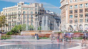 People at Placa de Catalunya or Catalonia Square timelapse a large square in central Barcelona photo