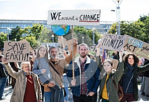 People with placards and posters on global strike for climate change.