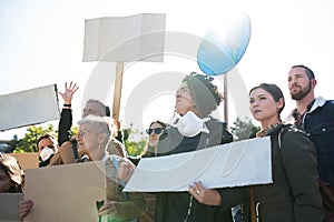 People with placards and posters on global strike for climate change.