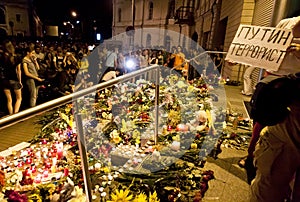 People place flowers at Dutch embassy in Kyiv