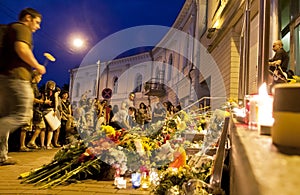 People place flowers at Dutch embassy in Kyiv