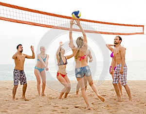 People playing beachvolley
