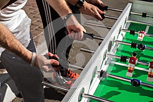 People Playing Enjoying Foosball Table