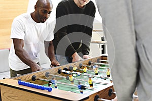 People Playing Enjoying Foosball Table Soccer Game Recreation Le