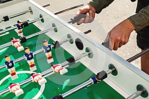 People Playing Enjoying Foosball Table