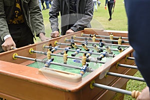 People Playing Enjoying Foosball Table Soccer Game Recreation Leisure