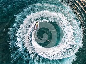 People are playing jet ski at sea during the holidays.