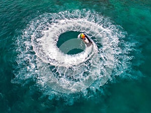 People are playing jet ski at sea during the holidays. And beaut