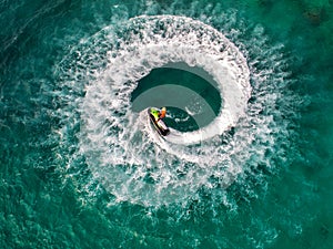 People are playing jet ski at sea during the holidays. And beaut