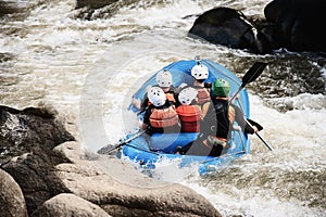 People playing raft adventure sport activity