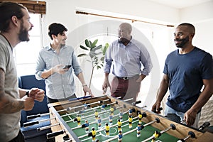 People playing table football together