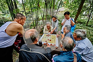 People playing Xiangqi chinese chess China