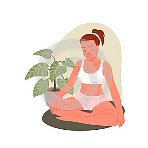 People practice yoga asana at home, young woman sitting in lotus position, padmasana