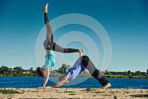 People practicing acroyoga