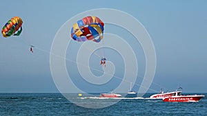 People practicing parasailng