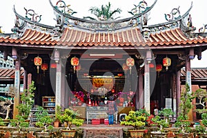 People pray for god in traditional oriental heritage temple in Taiwan